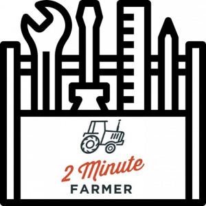 Icon of a toolbox containing a spanner, screwdriver, ruler and pencil. With the 2 minute farmer logo on the front